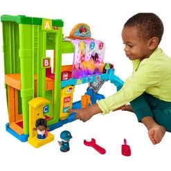 Fisher Price Fisher-Price Little People Light-Up Learning Garage 7 Fisher Price Fisher-Price Little People Light-Up Learning Garage -Children's Toy Store Fisher PriceLittlePeopleLight UpLearningGarage2